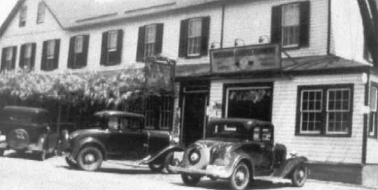 1930-1939 Hotel Calvert with three automobiles in front, Prince Frederick, Md