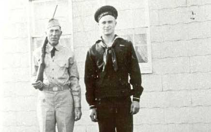 1940-1949 Paul Montgomery in the uniform of Charles County Minutemen, and William Bassford in Navy uniform