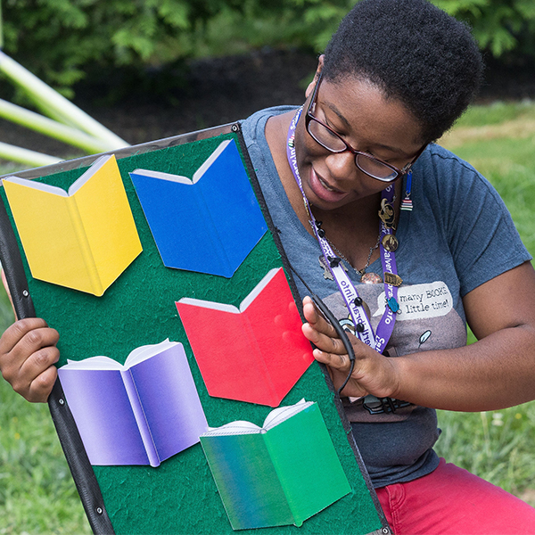 librarian holding book background