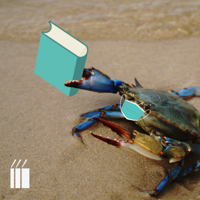 maryland blue crab holding a book and wearing a mask