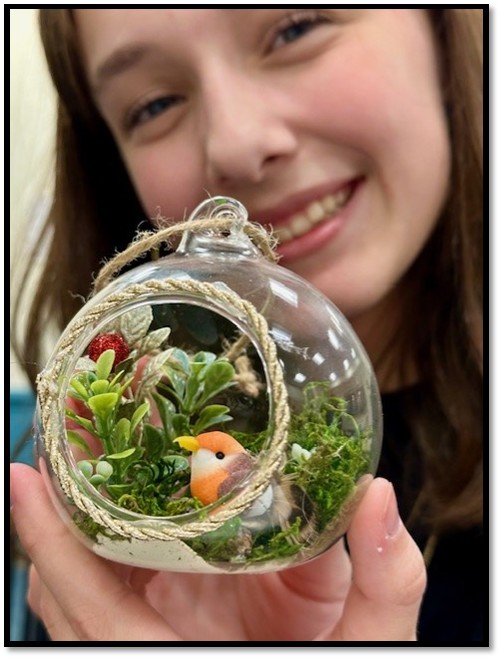 mini terrarium with teen girl